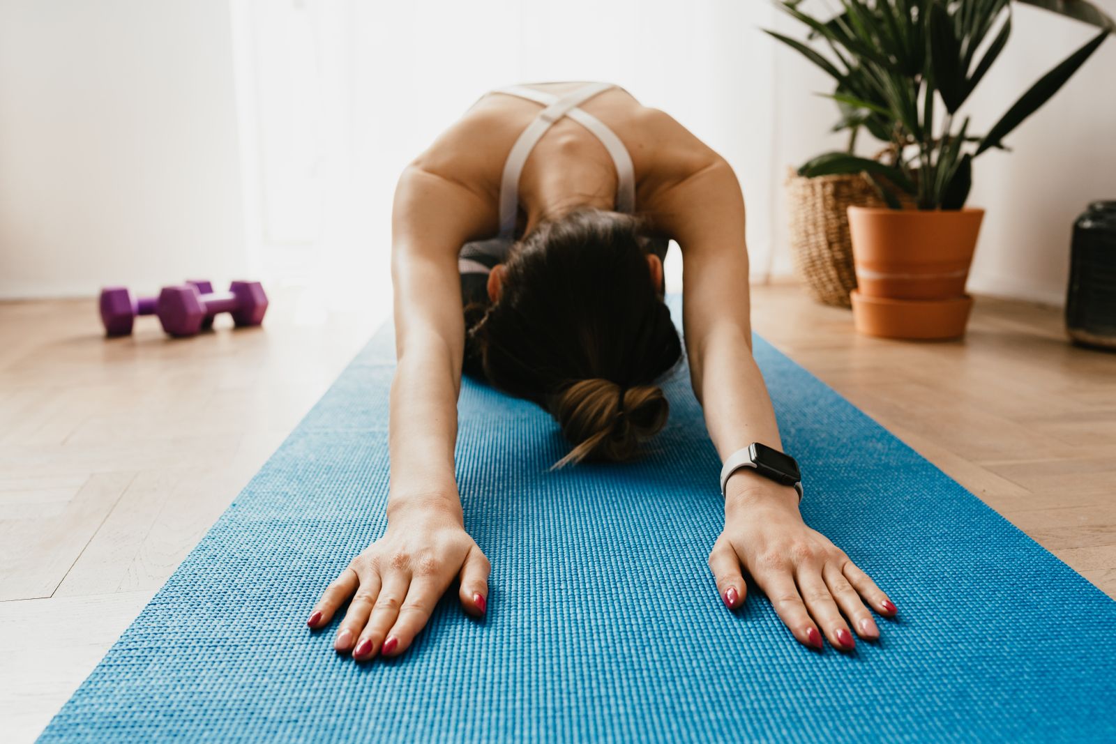 A restorative child's pose, a calming yoga for cortisol posture